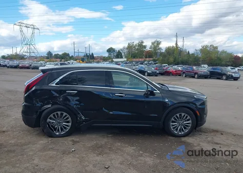 2024 Cadillac Xt4 Awd Premium Luxury from USA, damaged, VIN 1GYFZDR47RF151497